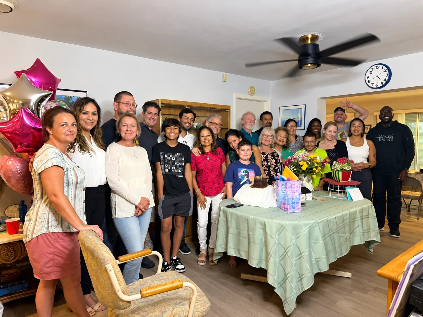 The Grace & Peace Church family gathered together around a decorated table