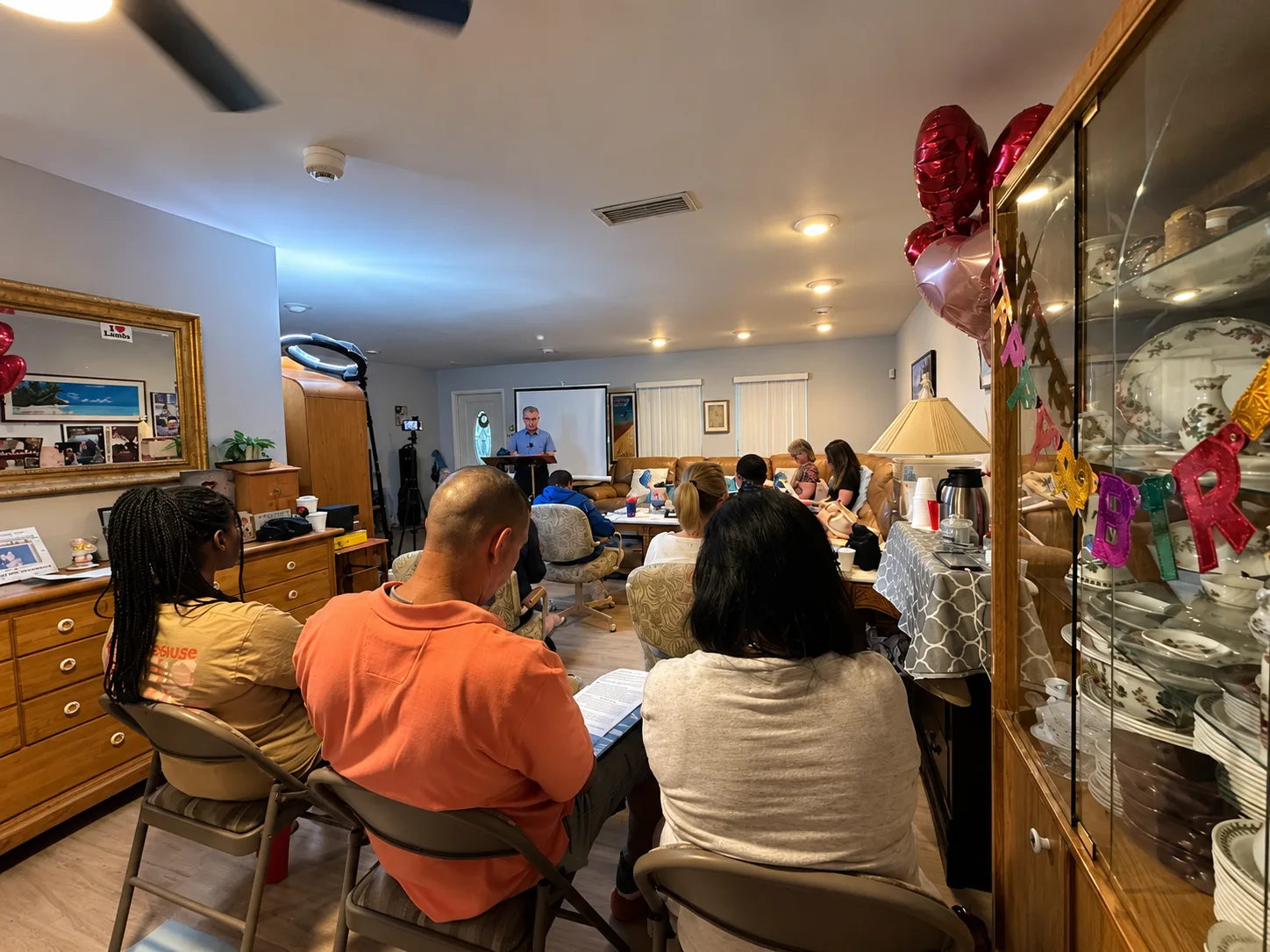 The church family gathered for worship as Pastor Frank preaches