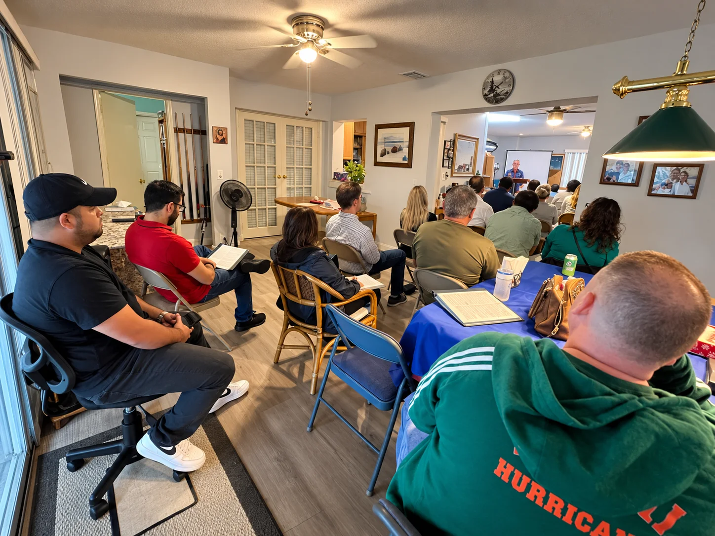Grace and Peace Church family gathering around Scripture